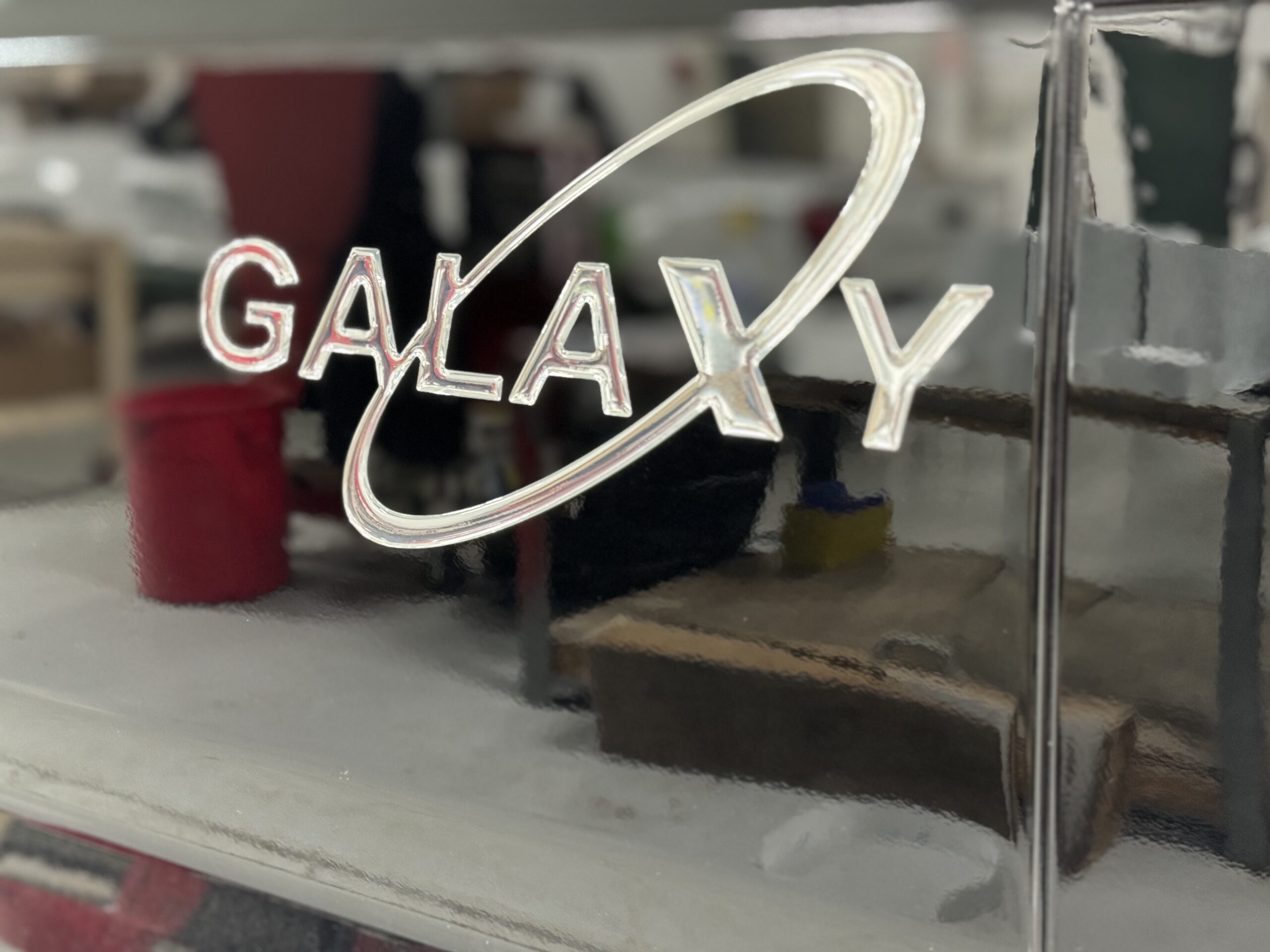 Ram Promaster Chrome Galaxy Logo on Waldoch Van