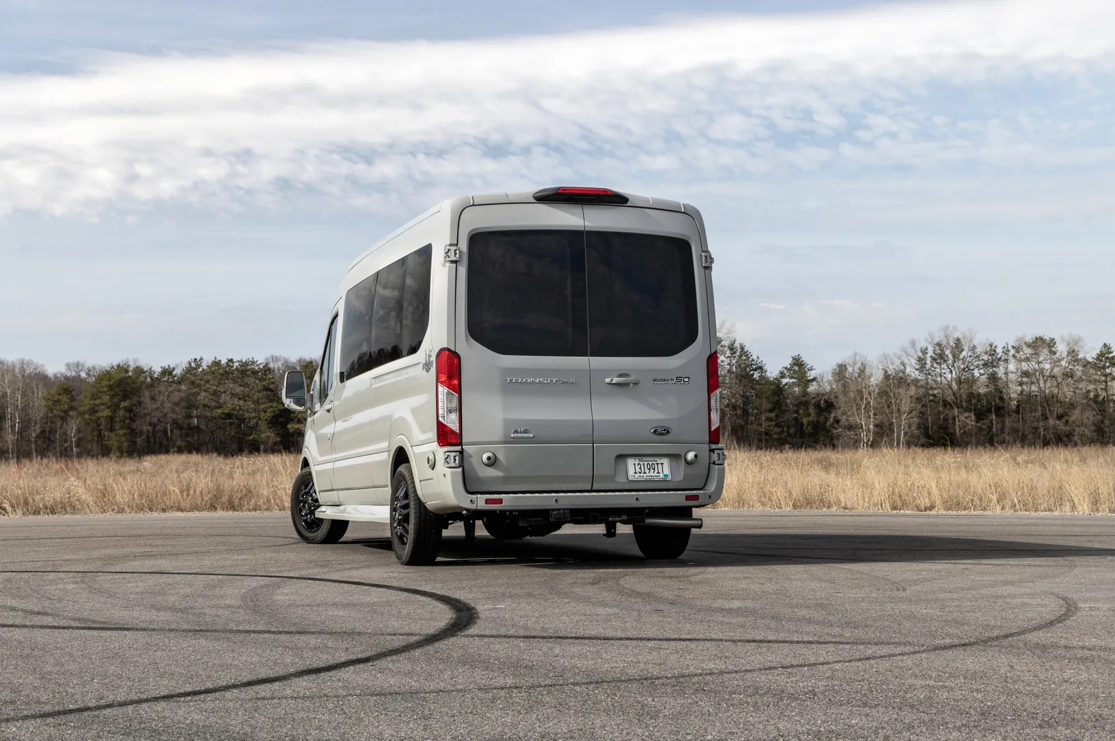 Rear exterior Waldoch Boundary Water Edition Conversion Van 9 Passenger Family Van Best Travel Vehicle