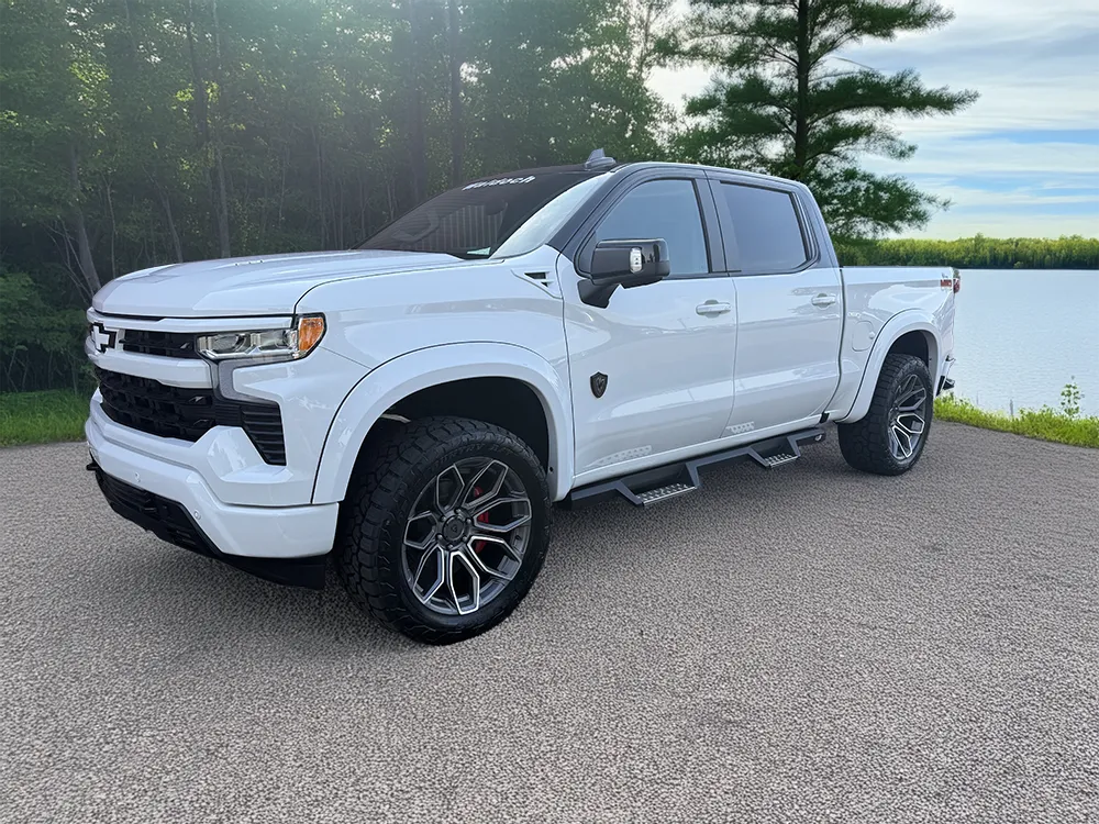 2026-chevy-1500-crewcab-m80-waldoch-white-black-tuxedo-front-driver-quarter