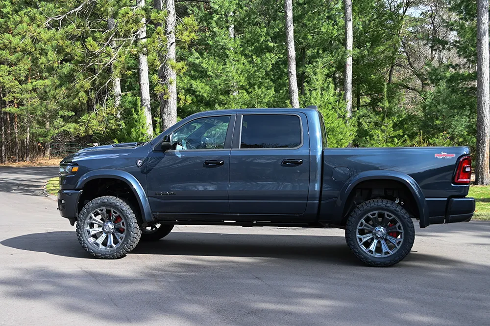 2026-ram-1500-rampage-waldoch-blue-side-driver-distance