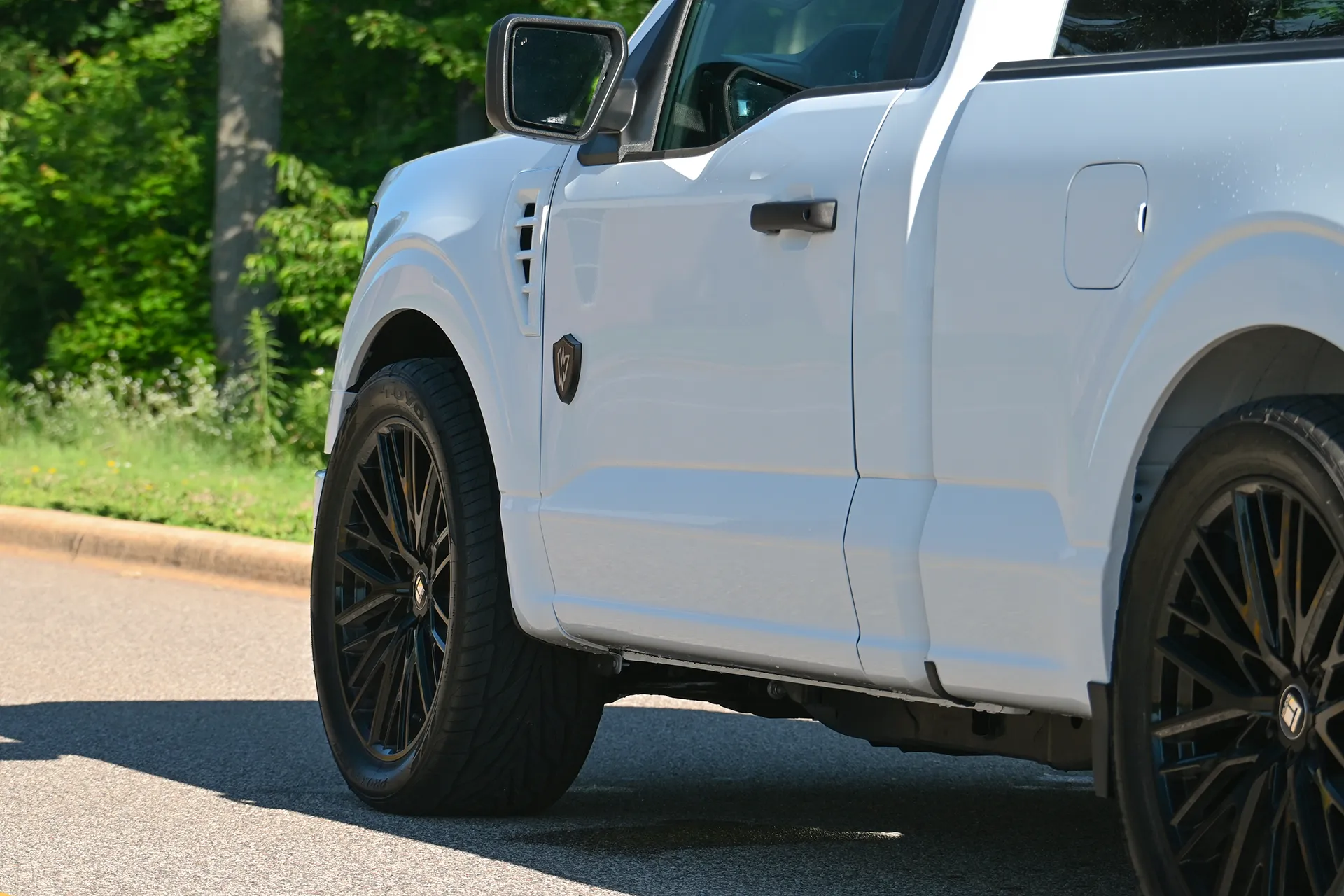 redline-f150-white-2026-reg-cab-driver-low