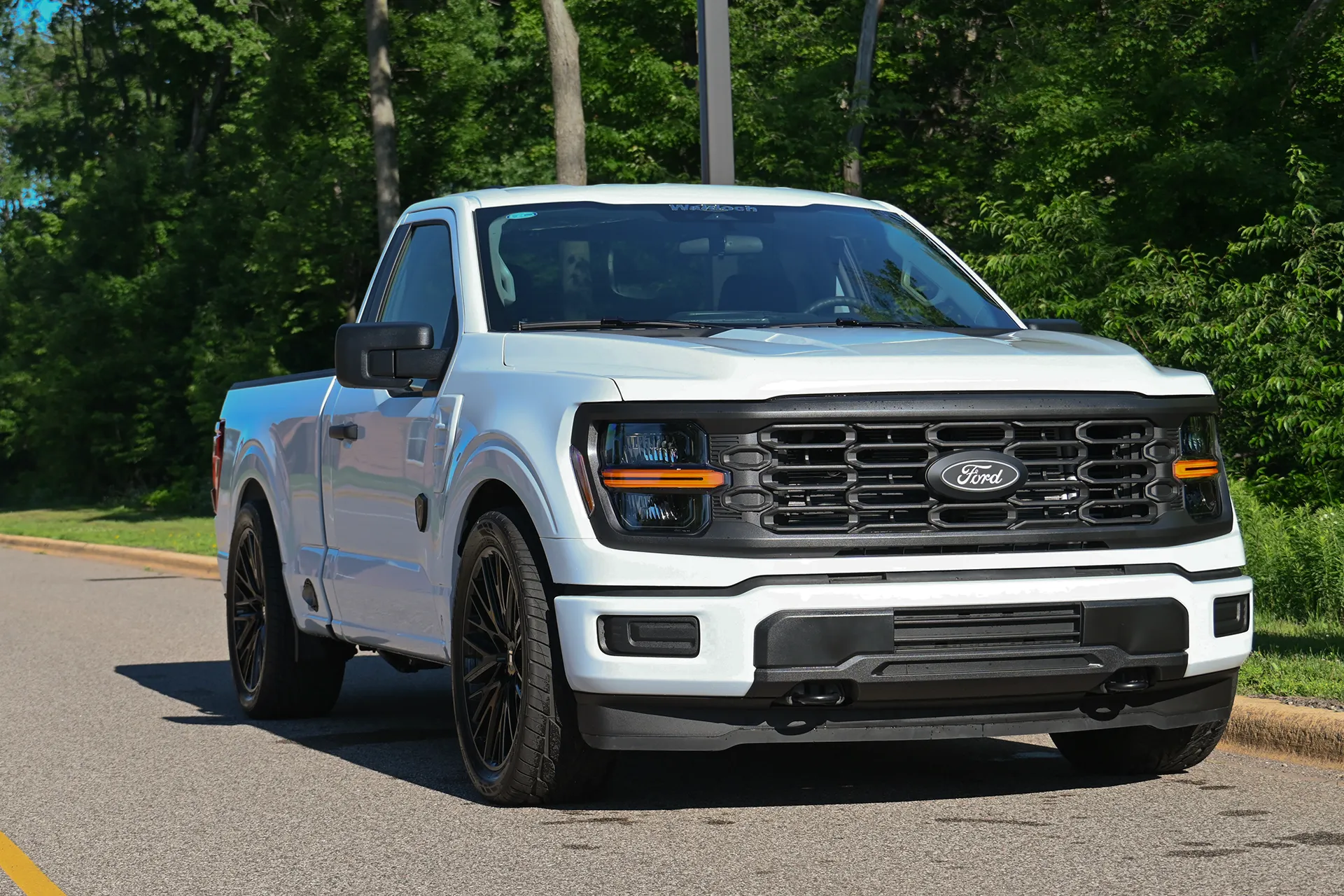 redline-f150-white-2026-reg-cab-front-angle-pass